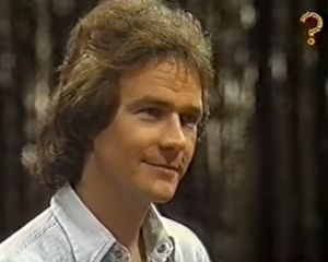 Contestant looking away from the camera