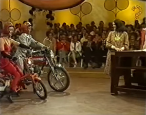 Two contestants on motorbikes